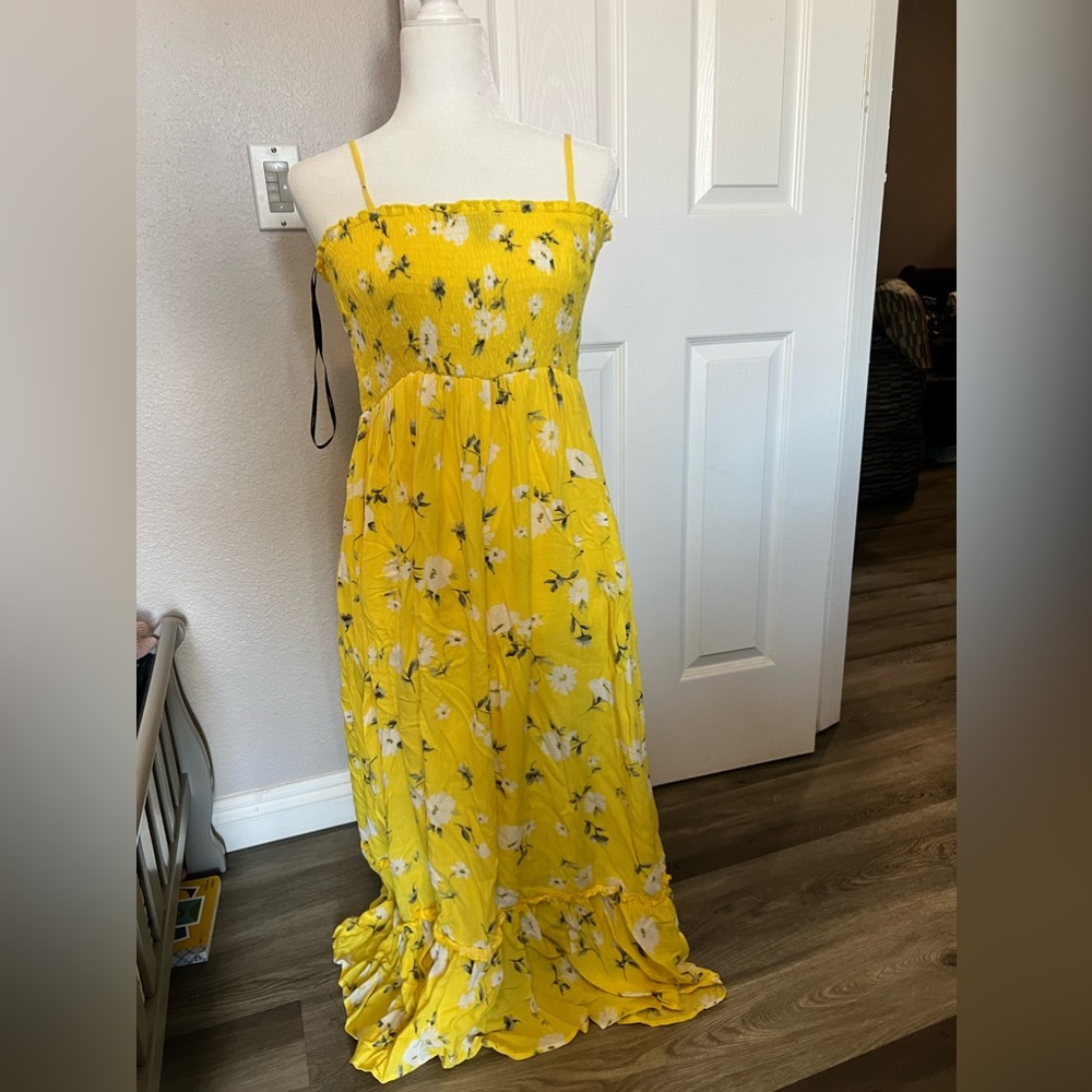 Bright yellow smocked dress